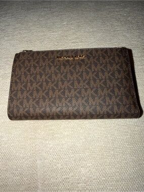 Michael Kors Brown Monogram Zip-Around Wallet with Gold Logo